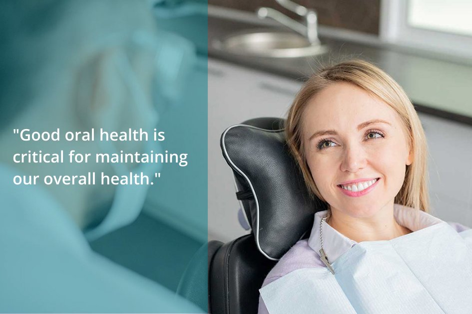 Woman smiling in dental chair, showcasing her smile makeover and emphasizing the importance of oral hygiene.