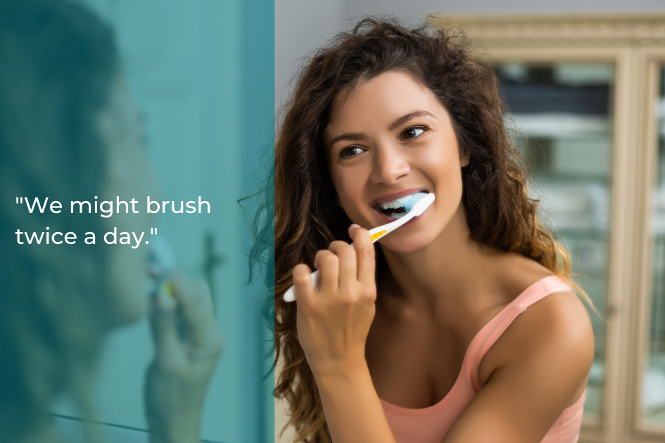 A person smiles while brushing their teeth in front of a mirror, with a quote on the image: "We might brush twice a day, but regular dental checkups bring lifesaving benefits.